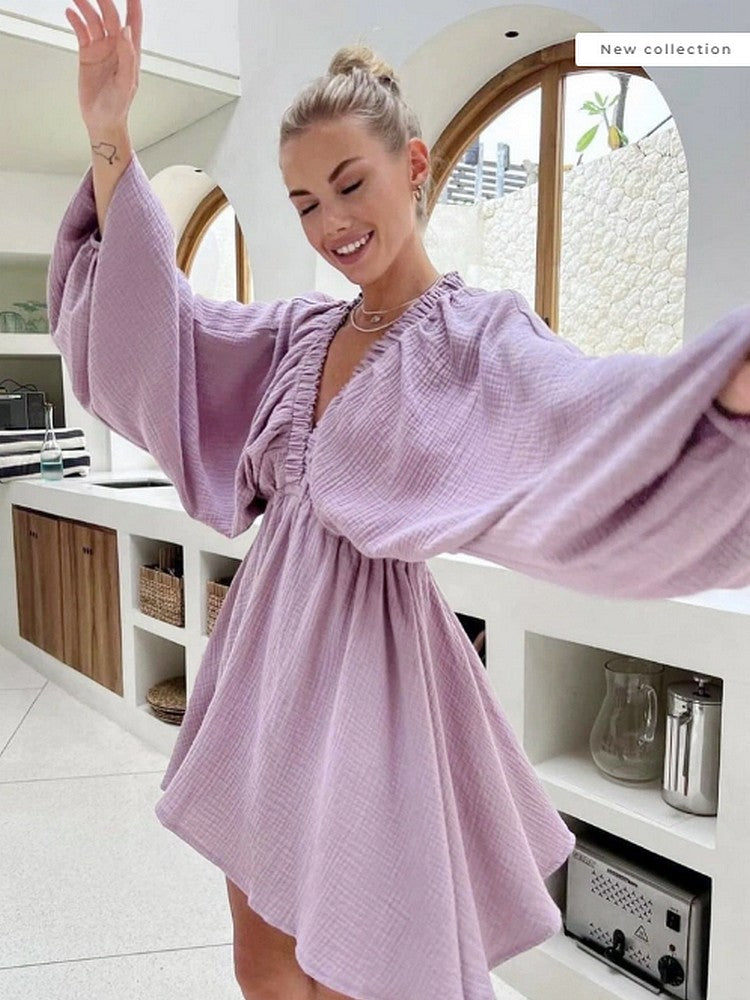 Short purple dress with ruffles